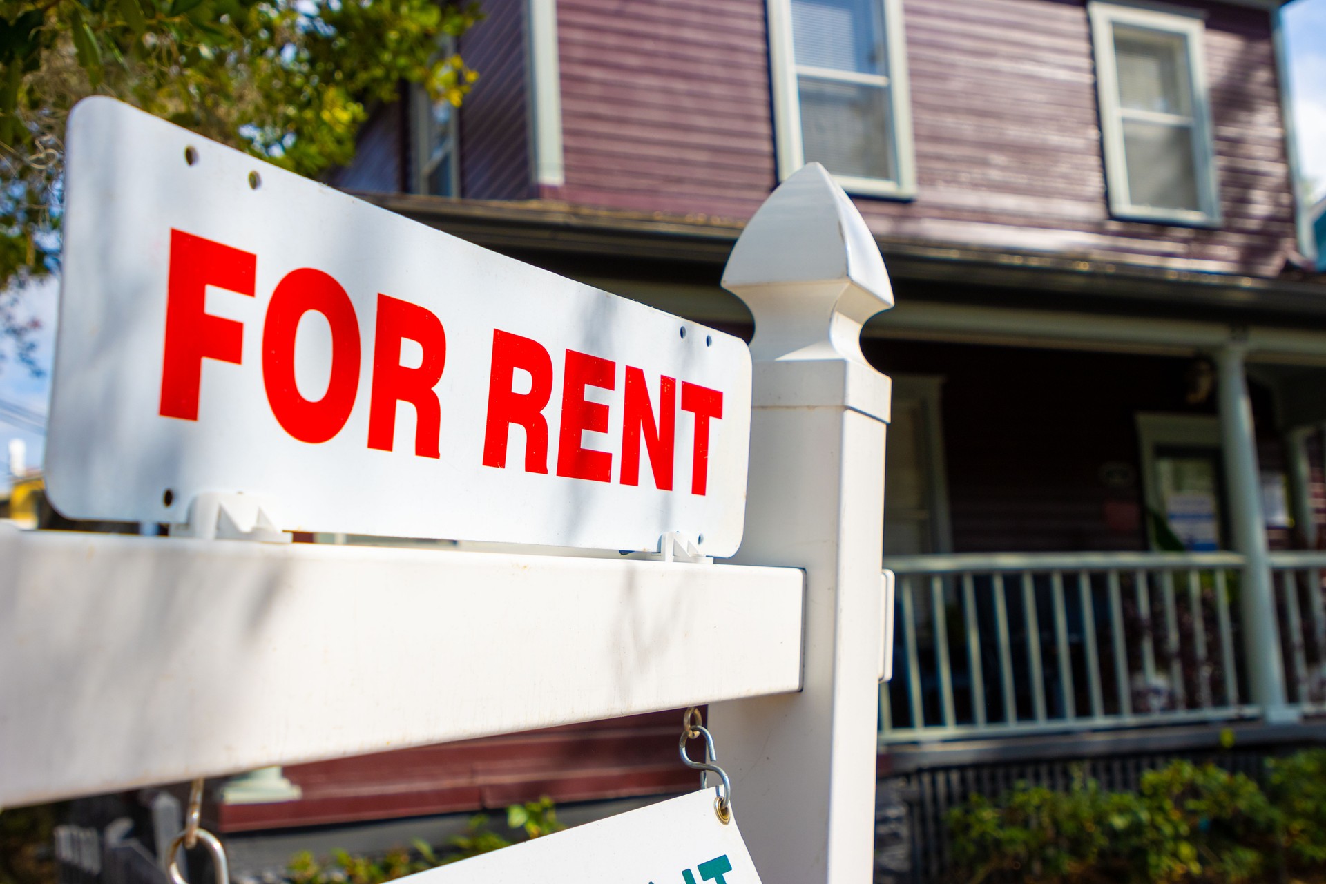 For rent sign in front of house